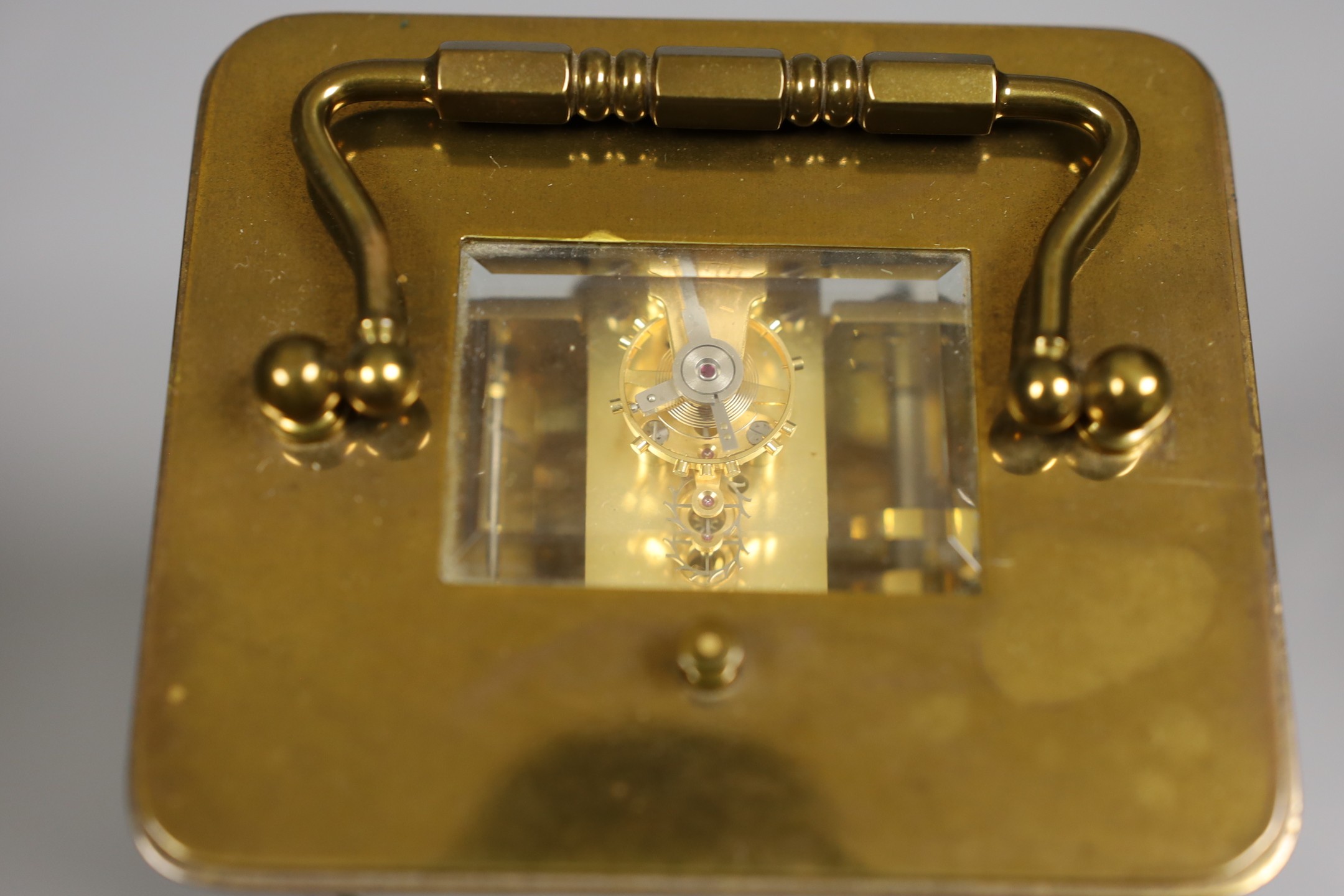 Matthew Norman brass carriage calendar clock and case, 13 cms high not including box